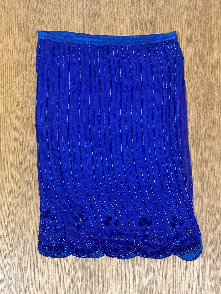 Download the full-sized PDF of Photo of Blue Beaded Skirt