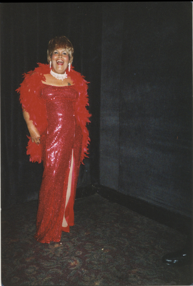 Download the full-sized image of Photo of Felicia Elizondo in Red Dress and Boa