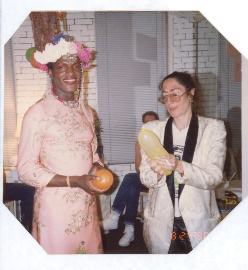 Download the full-sized image of A Photograph of Marsha P. Johnson Standing with Her Friend, Holding Balloons at Her Birthday Party