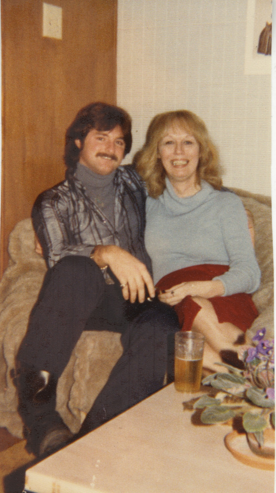 Download the full-sized image of Photo of Vicki Marlane and Bobby on a Couch