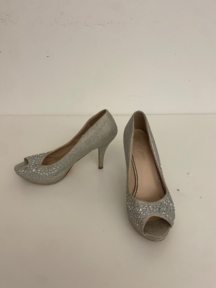 Download the full-sized PDF of Photo of Silver Sparkly Heels