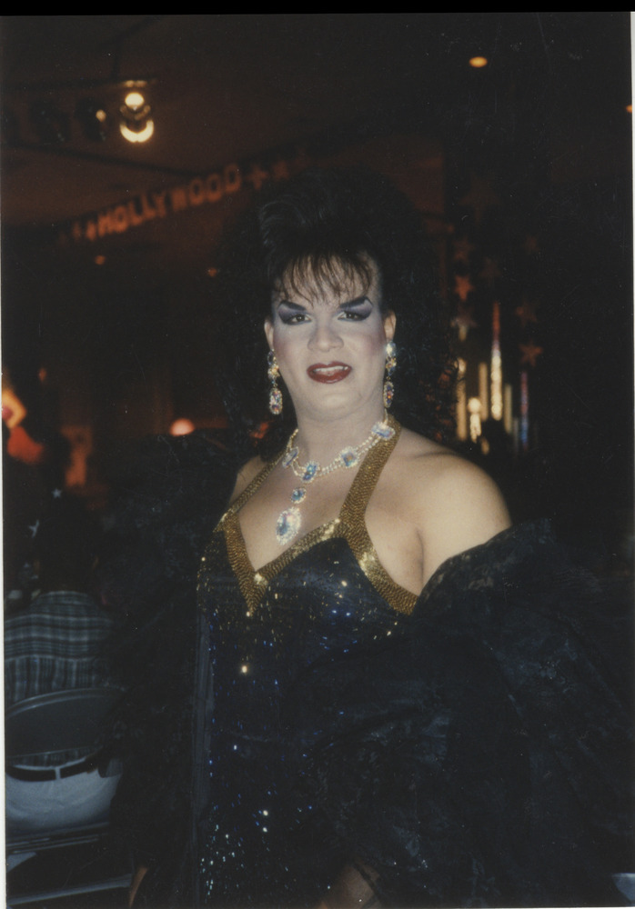 Download the full-sized image of Photo of Unknown Queen in Black and Gold Dress