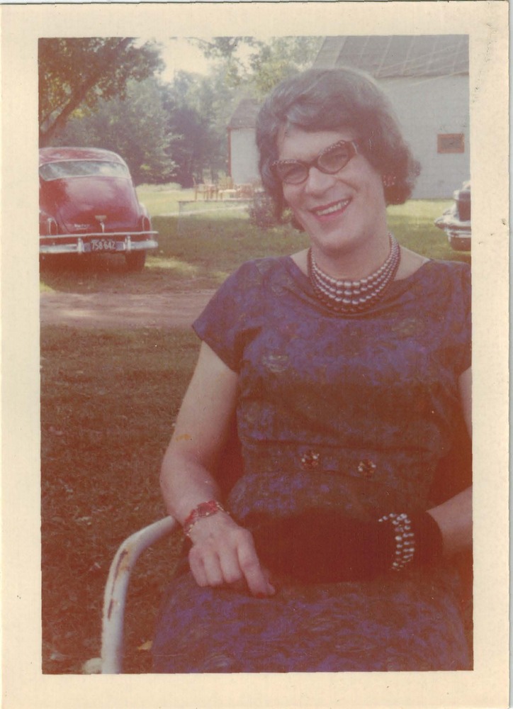 Download the full-sized image of A Photograph of Felicity Chandelle Seated and Smiling