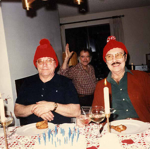 Download the full-sized image of Jackie Starr and friends in stocking caps around a table