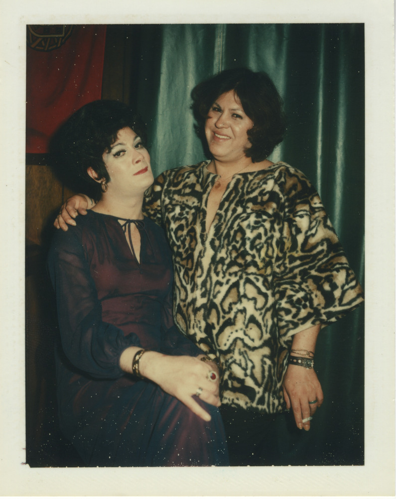 Download the full-sized image of Photo of Two People Smiling in front of Green Curtain