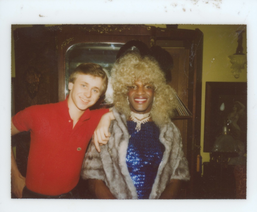 Download the full-sized image of A Photograph of Marsha P. Johnson Posing in a Sparkly Blue Gown Next to Her Roommate