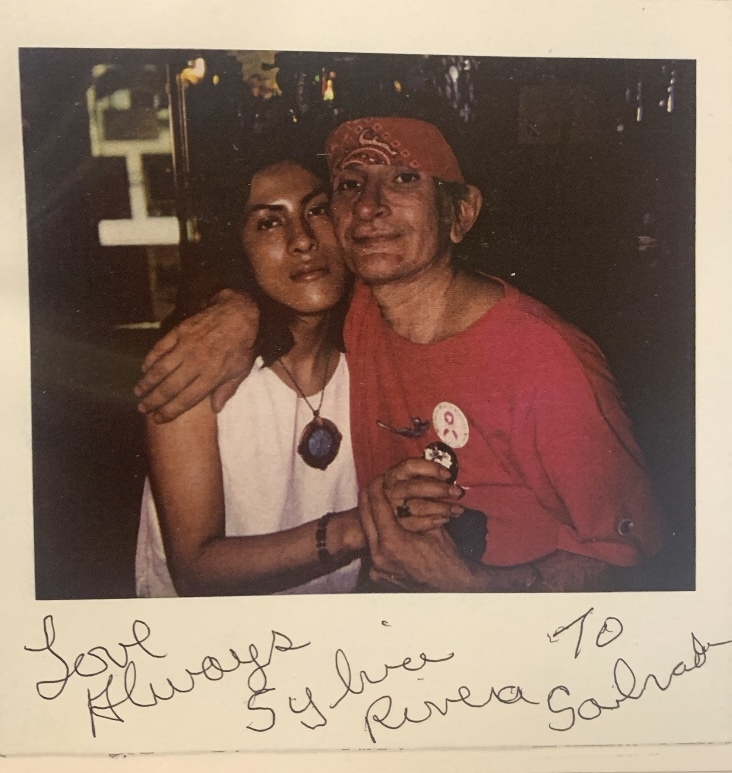 Download the full-sized image of A polaroid of Sylvia Rivera and Melissa with Their Arms around Each Other