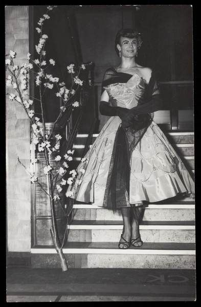 Download the full-sized image of A sailor in drag on S.S. Caronia. Photograph, 195-.