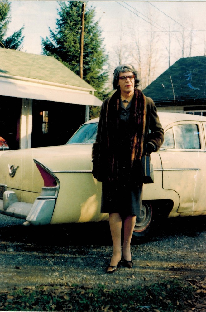 Download the full-sized image of A Photograph of Felicity Chandelle in front of a Car