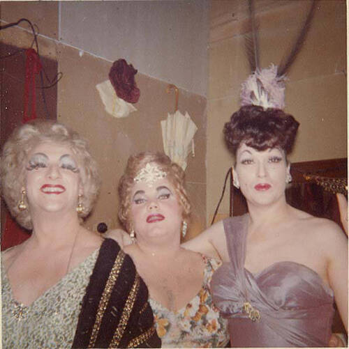 Download the full-sized image of Countess Estelle posing with two unknown femmes with feathery headpieces.