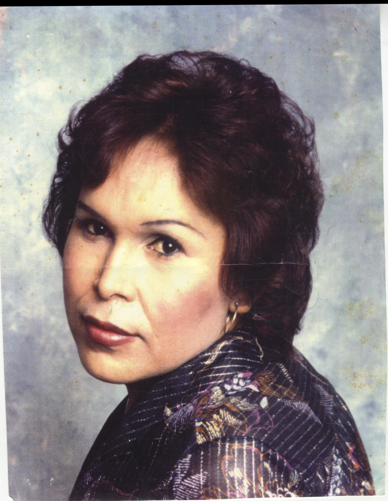 Download the full-sized image of Photo of Felicia Elizondo with Blue Background