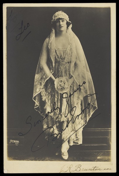 Download the full-sized image of Bert Errol, in drag, dressed as a bride. Photographic postcard by Apeda, 192-.
