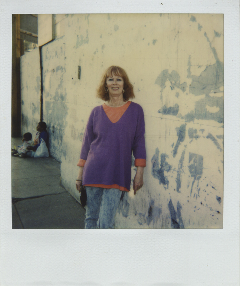 Download the full-sized image of Photo of Vicki Marlane Leaning on a Wall