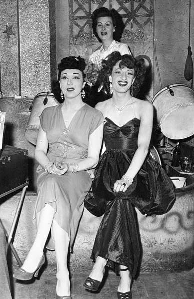 Download the full-sized image of Jackie Starr and another person sitting in front of a drum kit