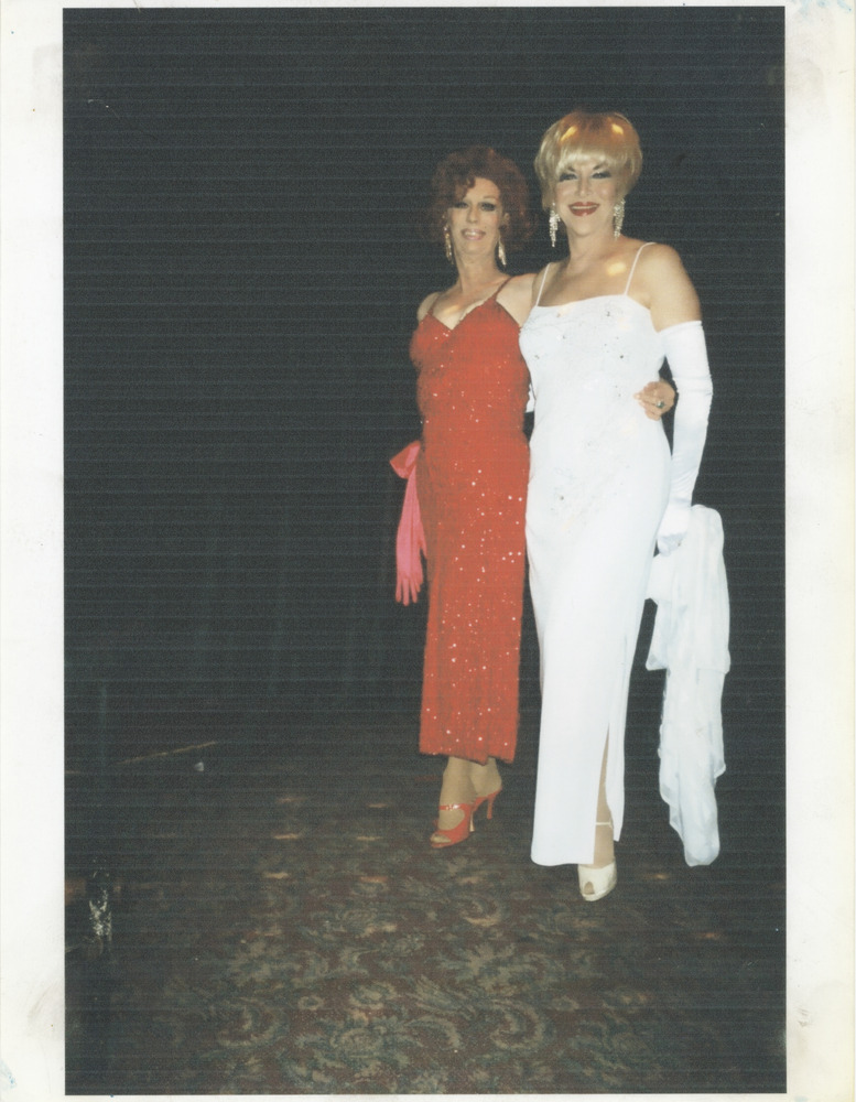 Download the full-sized image of Photo of Vicki Marlane and Person in White Dress