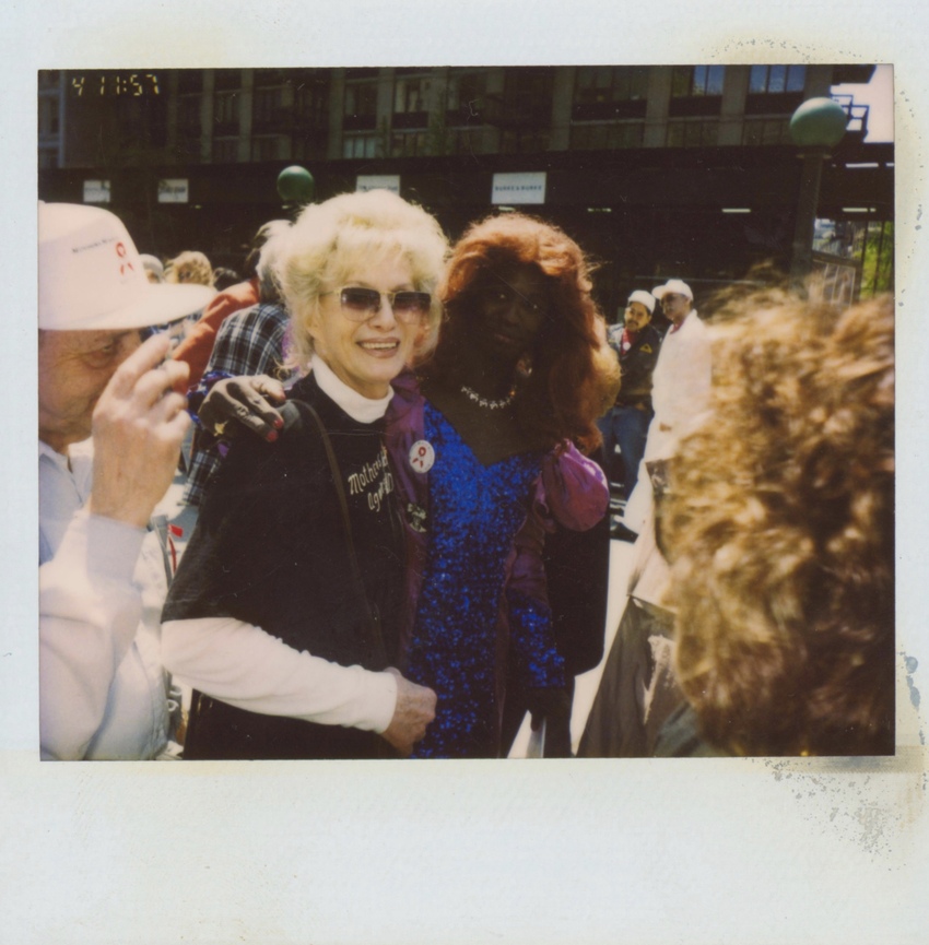 Download the full-sized image of A Polaroid of Cocoa Rodriguez with Her Arm Around Another Person