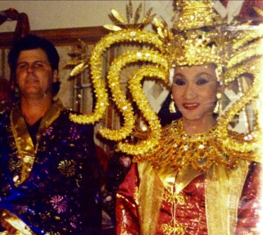 Download the full-sized image of A Photograph of Karina Samala in a Gold Beaded Headpiece