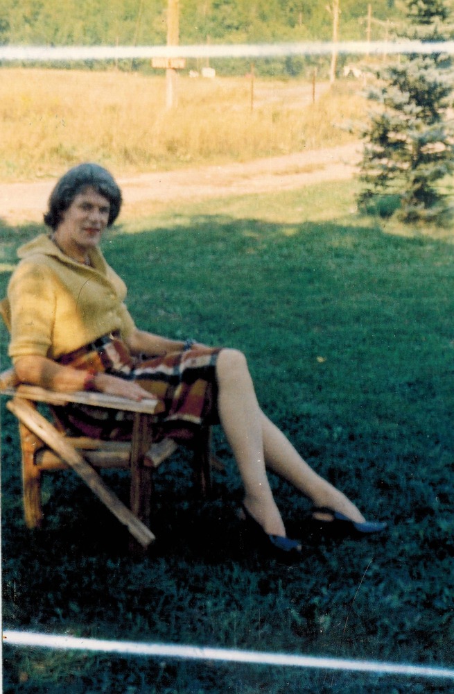 Download the full-sized image of A Photograph of Felicity Chandelle in a Yellow Sweater