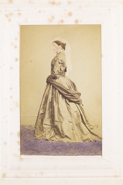Download the full-sized image of A man in drag posing side-on. Photograph, 189-.