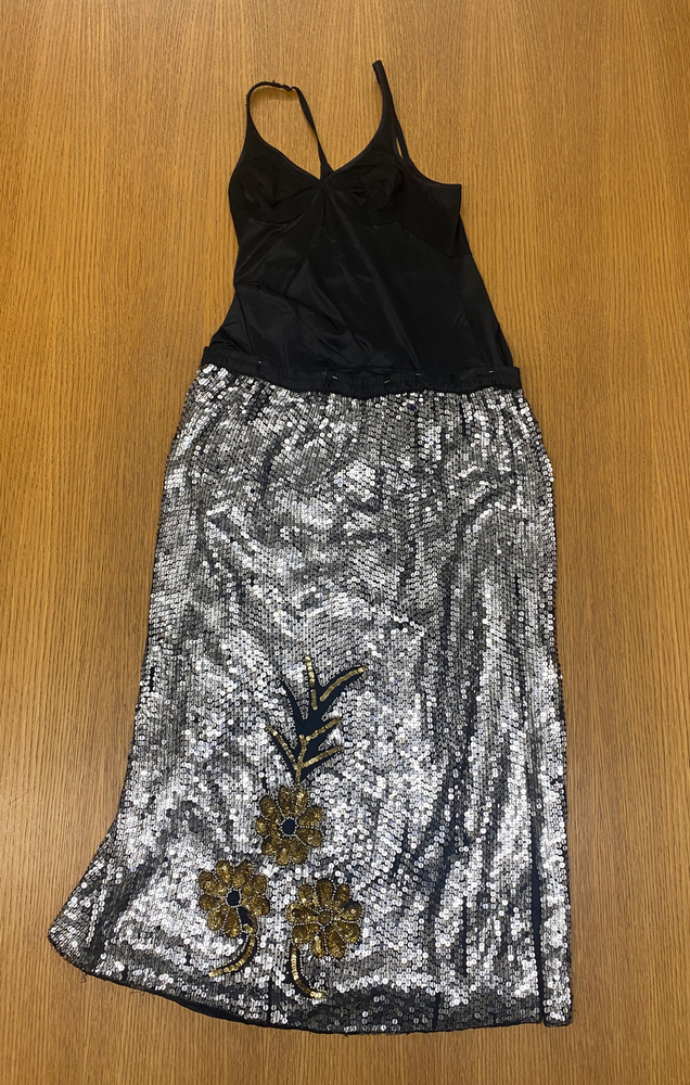 Download the full-sized PDF of Photo of Black and Silver Sequined Dress