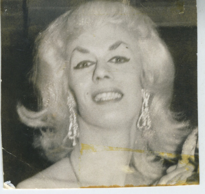 Download the full-sized image of Photo of Vicki Marlane with Dangling Earrings