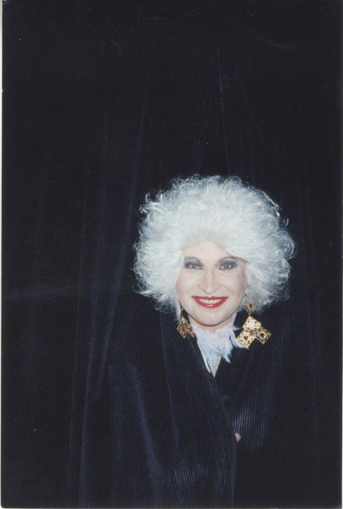 Download the full-sized PDF of Photo of Cartiar Behind Curtain