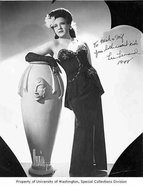Download the full-sized image of Lee Leonard leaning on a vase, promotional photograph